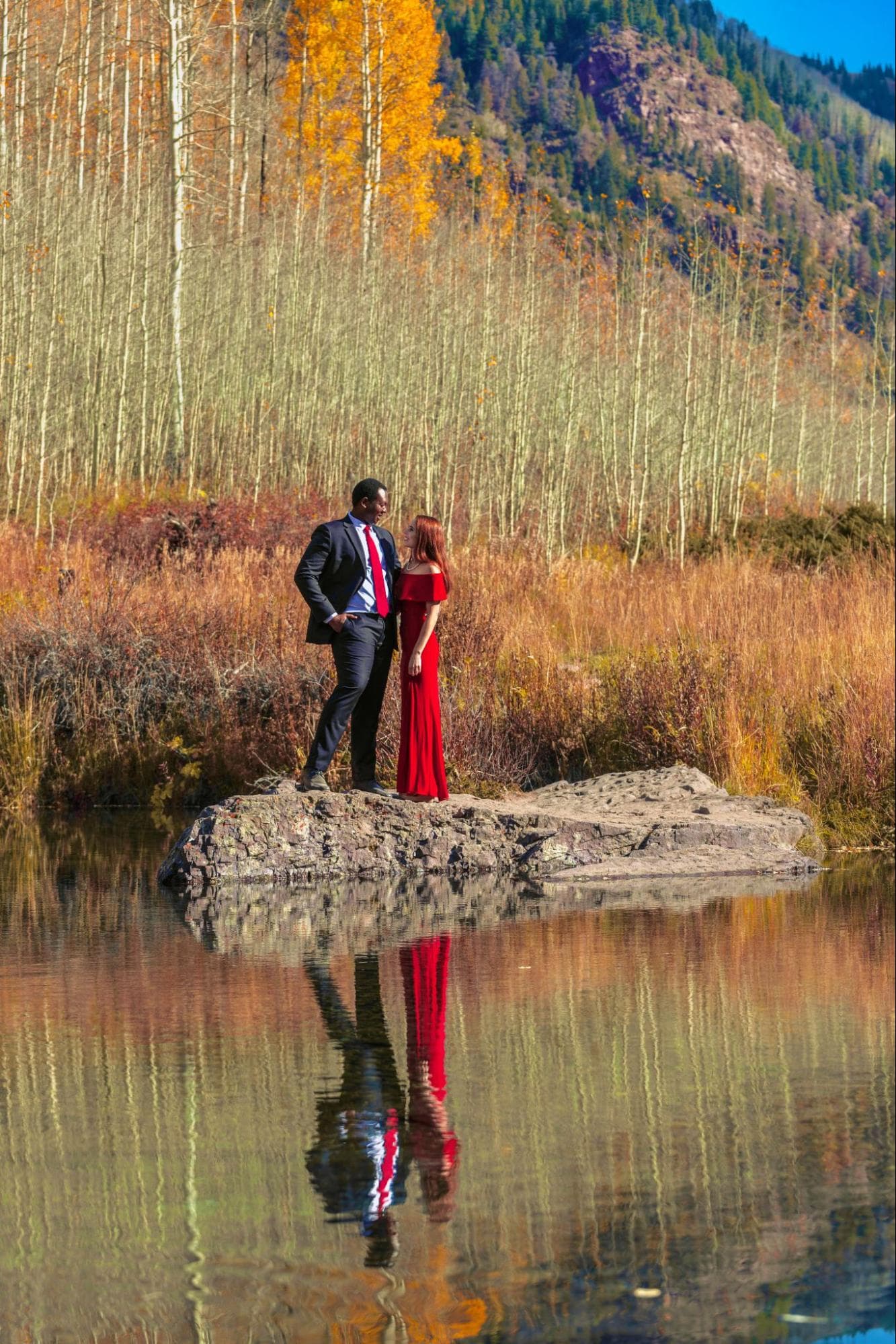 Abdel and Emily by the lake in the mountains